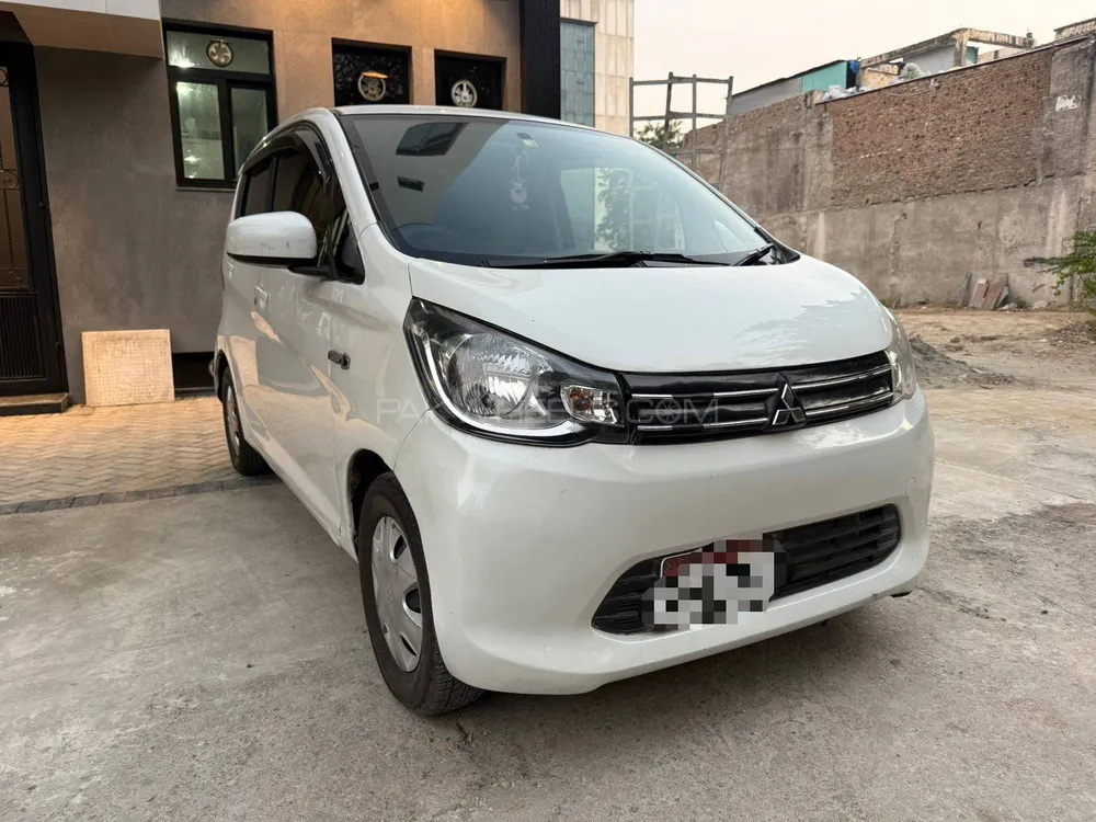 مٹسوبیشی ای کے ویگن 2014 for Sale in اسلام آباد مٹسوبیشی ای کے ویگن 2014 for Sale in اسلام آباد Image-2