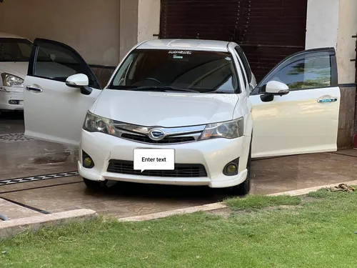 Toyota Corolla Fielder Hybrid G 2014