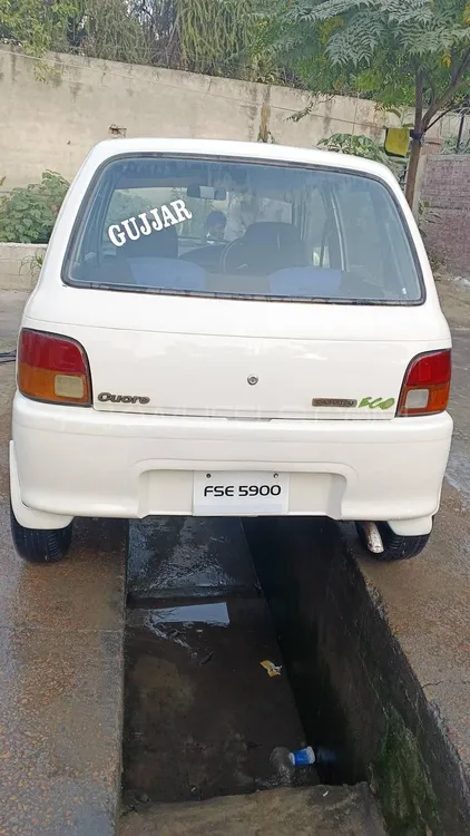 Daihatsu Cuore 2004 for Sale in Attock Daihatsu Cuore 2004 for Sale in Attock Image-1