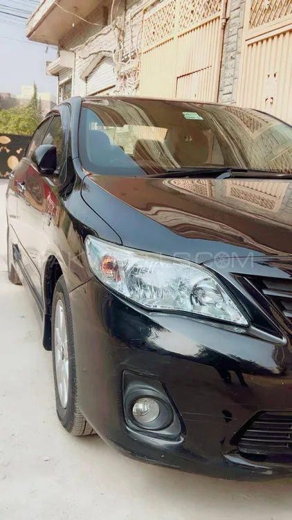 Toyota Corolla 2014 for Sale in Peshawar Toyota Corolla 2014 for Sale in Peshawar Image-1