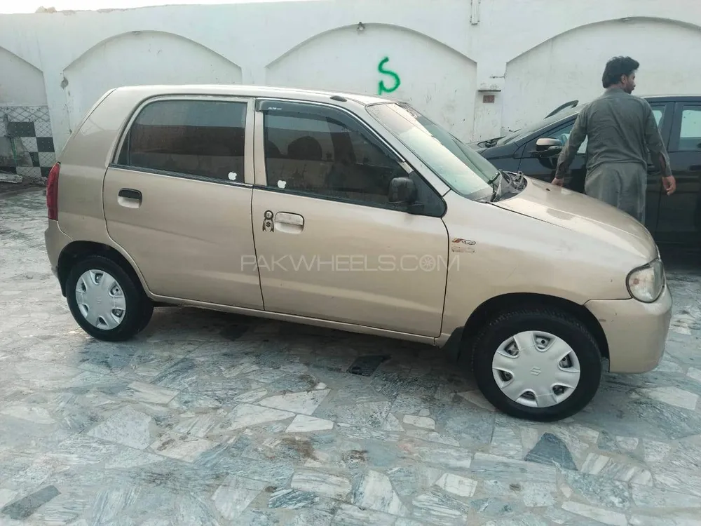 Daihatsu Cuore 2004 for Sale in Peshawar Image-1