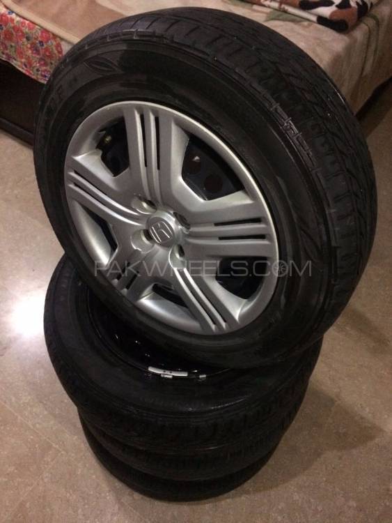Almost Brand new Rims & Dunlop Tyres Best for Vitz,Corolla,Civic e.t.c Image-1