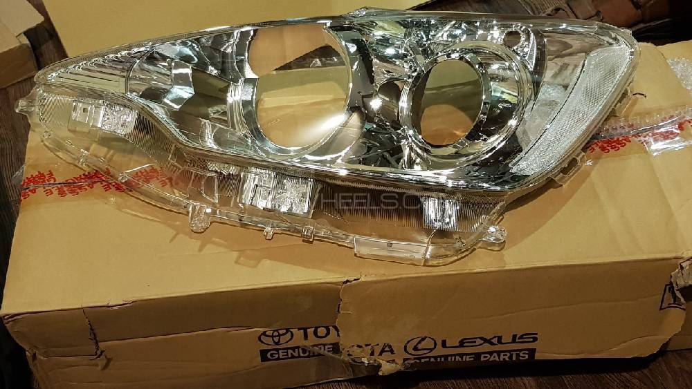 Toyota Aqua PAIR of Genuine Headlight Reflector and Glass Image-1