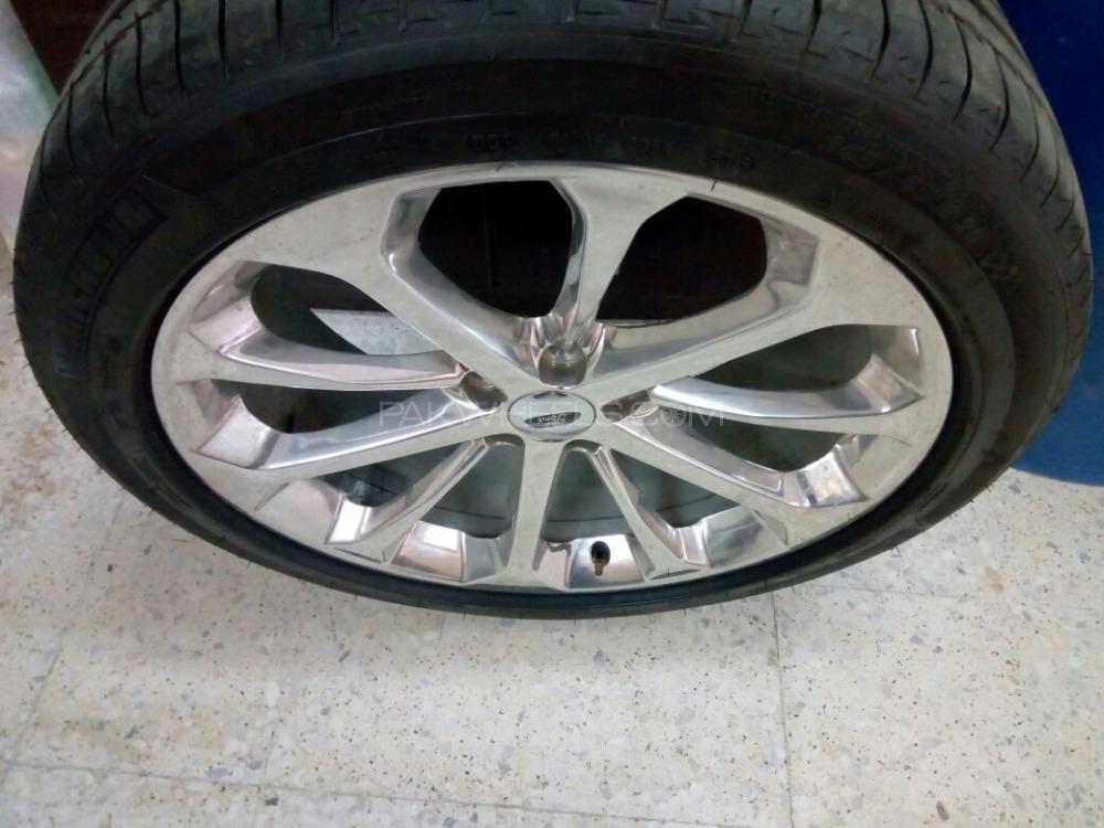 FIx price 75k......ford original rims and Michelin Tires  Image-1