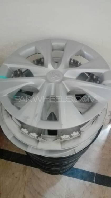 New Corolla GLI 2018 Rims with Wheel caps (15 size 5 nuts) Image-1