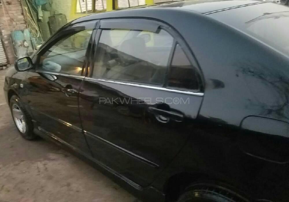 Toyota Corolla 2004 for Sale in Peshawar Toyota Corolla 2004 for Sale in Peshawar Image-2