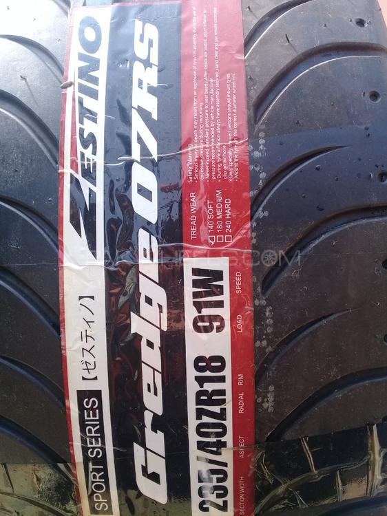 Brand new slick tires. 235.40.r18.  Image-1