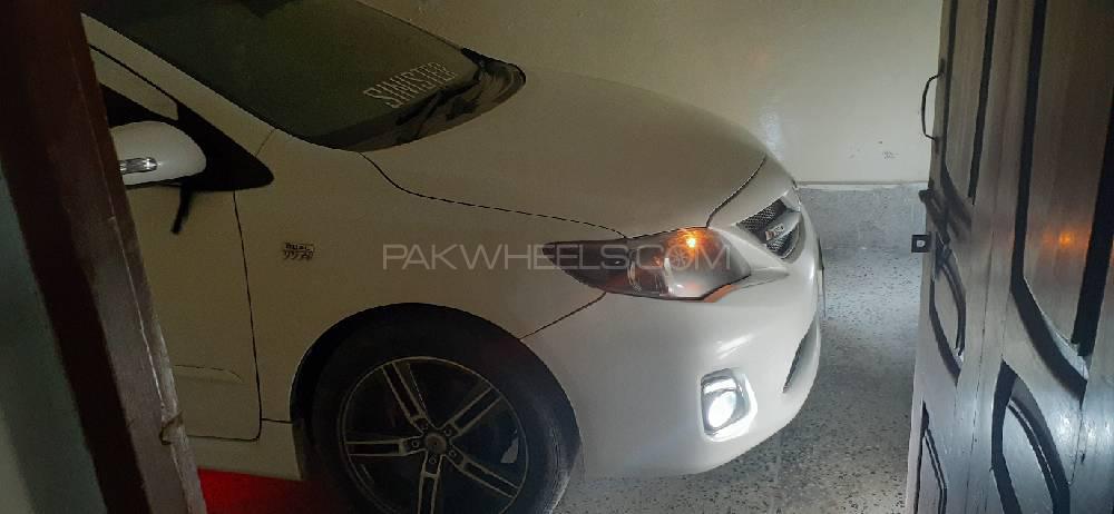 Toyota Corolla 2014 for Sale in Peshawar Toyota Corolla 2014 for Sale in Peshawar Image-4
