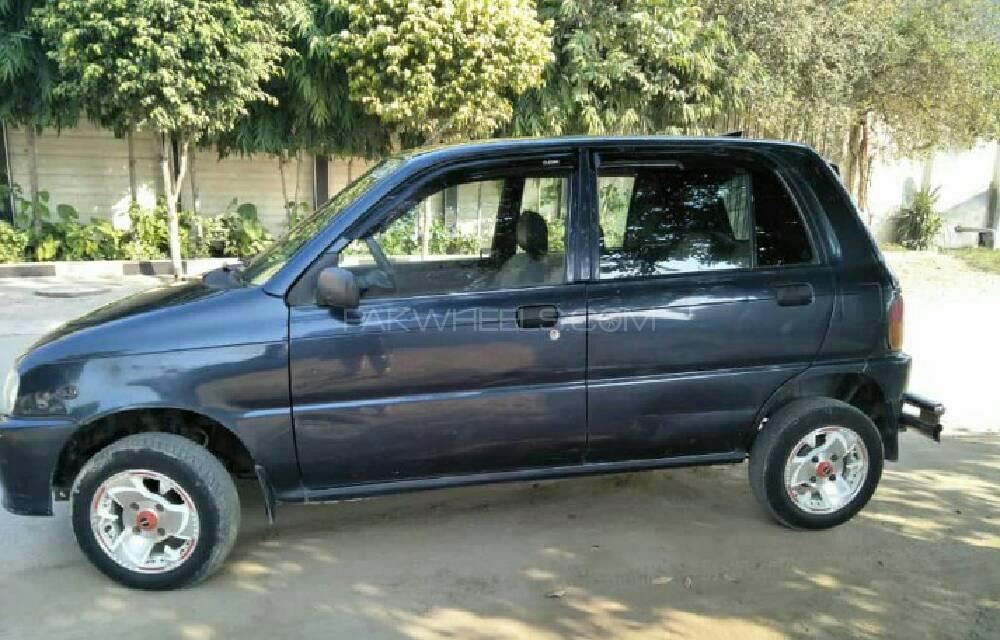 Daihatsu Cuore 2004 for Sale in Lahore Daihatsu Cuore 2004 for Sale in Lahore Image-5