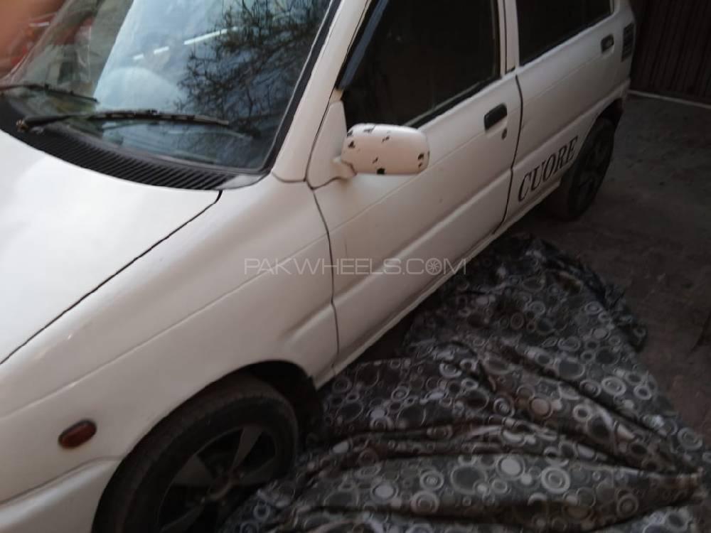 Daihatsu Cuore 2004 for Sale in Lahore Daihatsu Cuore 2004 for Sale in Lahore Image-5