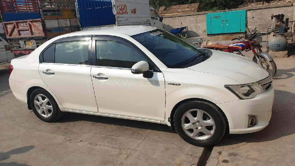 Toyota Corolla Axio 2014 for Sale in Faisalabad Image-1
