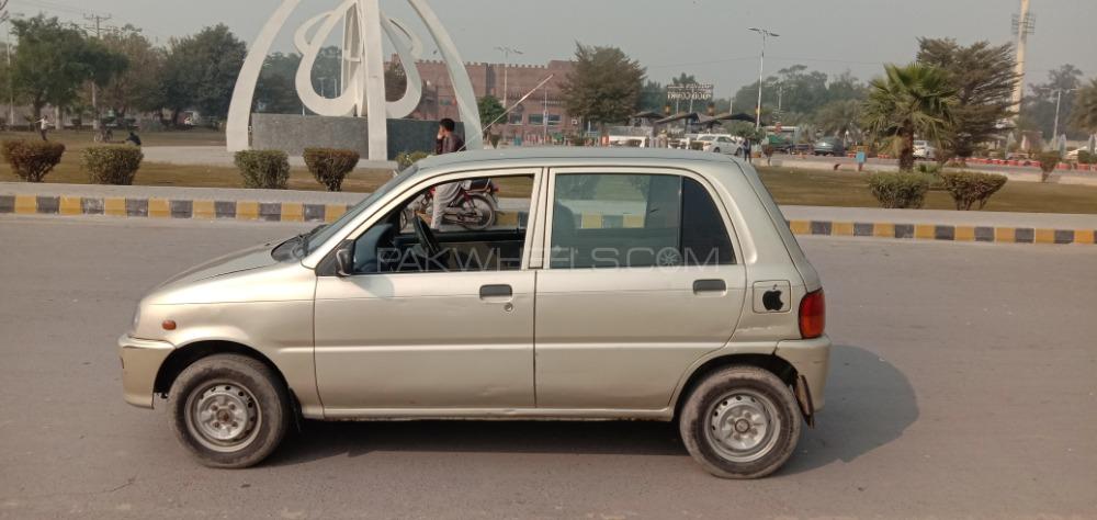 Daihatsu Cuore 2009 for Sale in Faisalabad Image-1