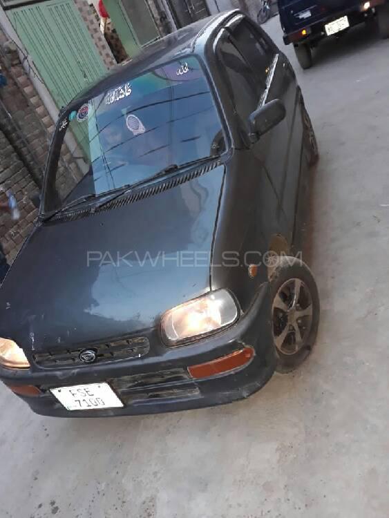 ڈائیہاتسو کیور - 2004 coure ڈائیہاتسو کیور - 2004 coure Image-6