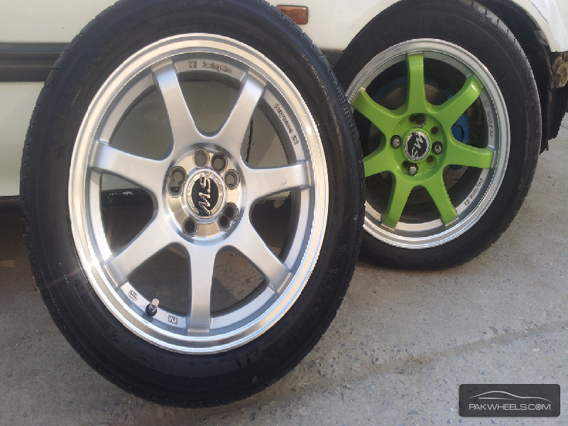 15 inchez light weight sports MS branded rims with tyres Image-1