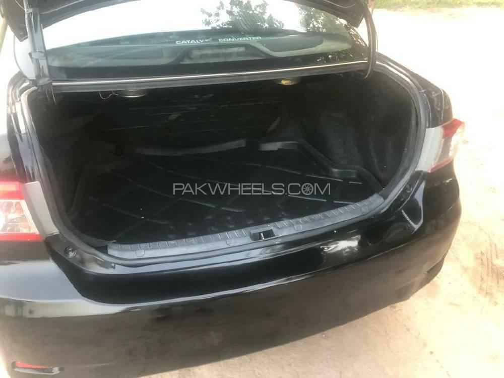 Toyota Corolla 2014 for Sale in Faisalabad Toyota Corolla 2014 for Sale in Faisalabad Image-15