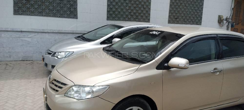 Toyota Corolla 2013 for Sale in Faisalabad Image-1