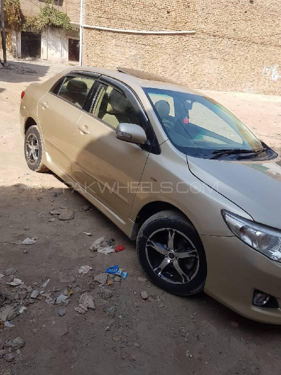 Toyota Corolla 2010 for Sale in Peshawar Toyota Corolla 2010 for Sale in Peshawar Image-16