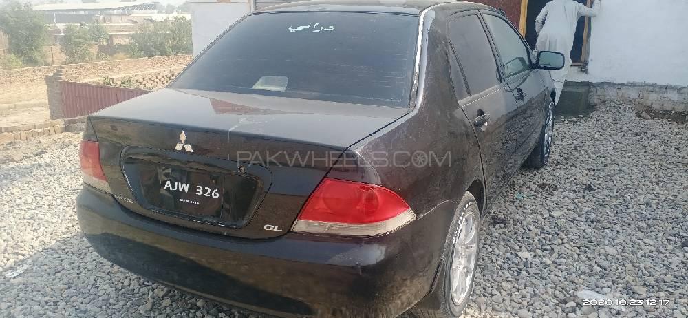 Mitsubishi Lancer 2005 for Sale in Peshawar Mitsubishi Lancer 2005 for Sale in Peshawar Image-5