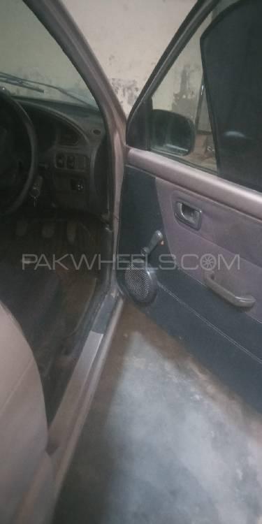Daihatsu Cuore 2003 for Sale in Faisalabad Image-1