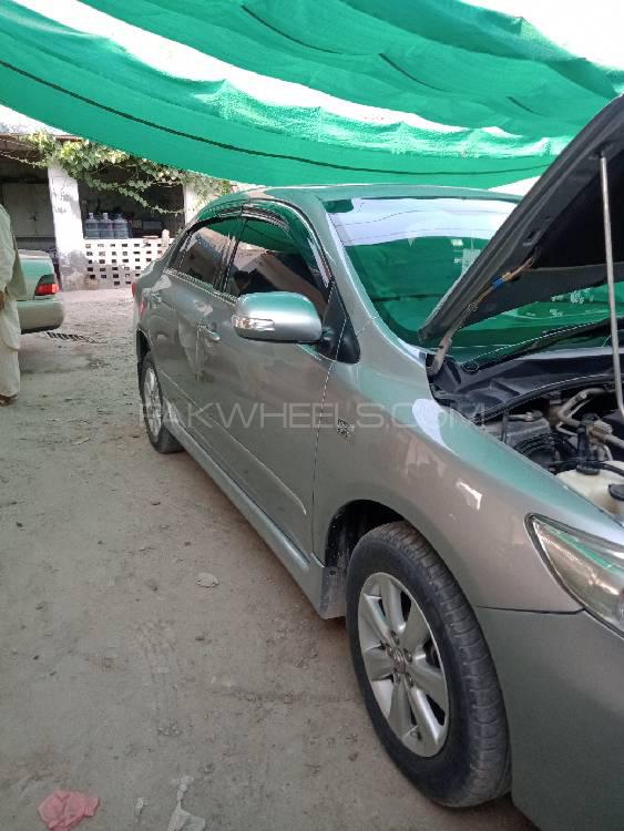 Toyota Corolla 2013 for Sale in Dera ismail khan Toyota Corolla 2013 for Sale in Dera ismail khan Image-13