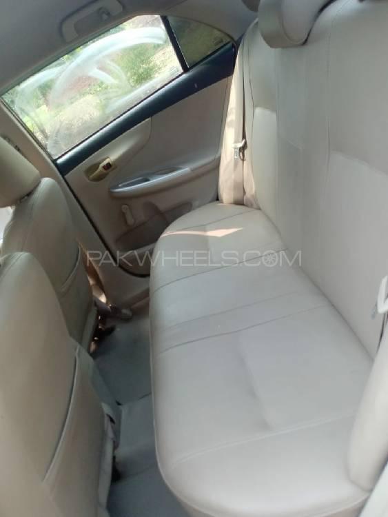 Toyota Corolla 2014 for Sale in Chak jhumra Toyota Corolla 2014 for Sale in Chak jhumra Image-12