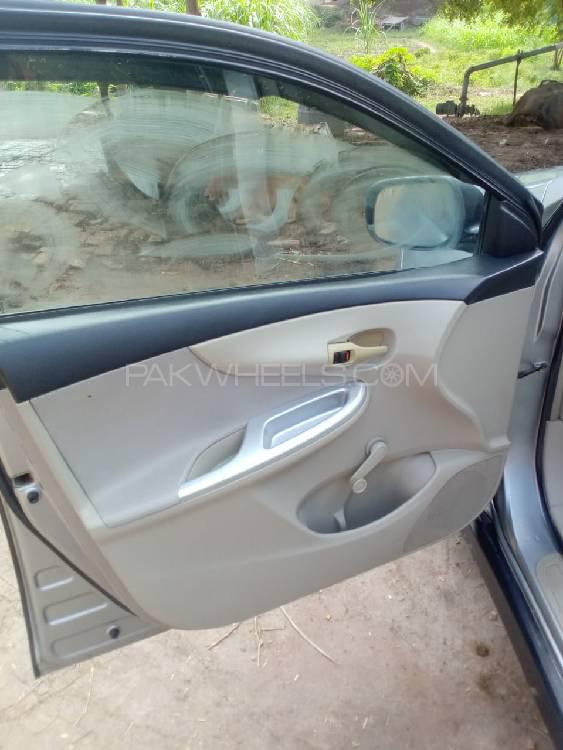 Toyota Corolla 2014 for Sale in Chak jhumra Toyota Corolla 2014 for Sale in Chak jhumra Image-3