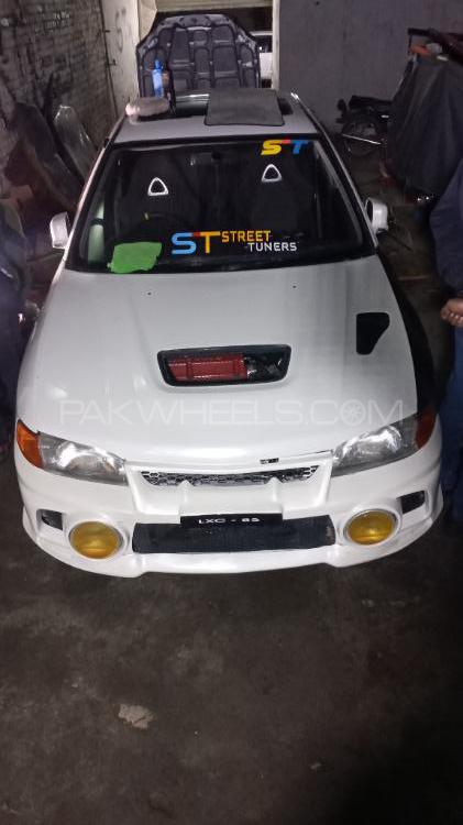 Mitsubishi Lancer Evolution X - 2002  Mitsubishi Lancer Evolution X - 2002  Image-2