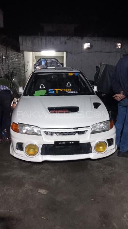 Mitsubishi Lancer Evolution X - 2002  Mitsubishi Lancer Evolution X - 2002  Image-4