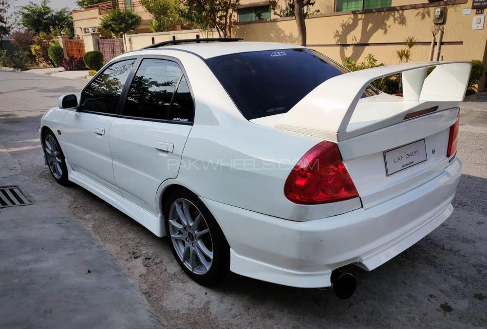 Mitsubishi Lancer Evolution X - 1996  Mitsubishi Lancer Evolution X - 1996  Image-3