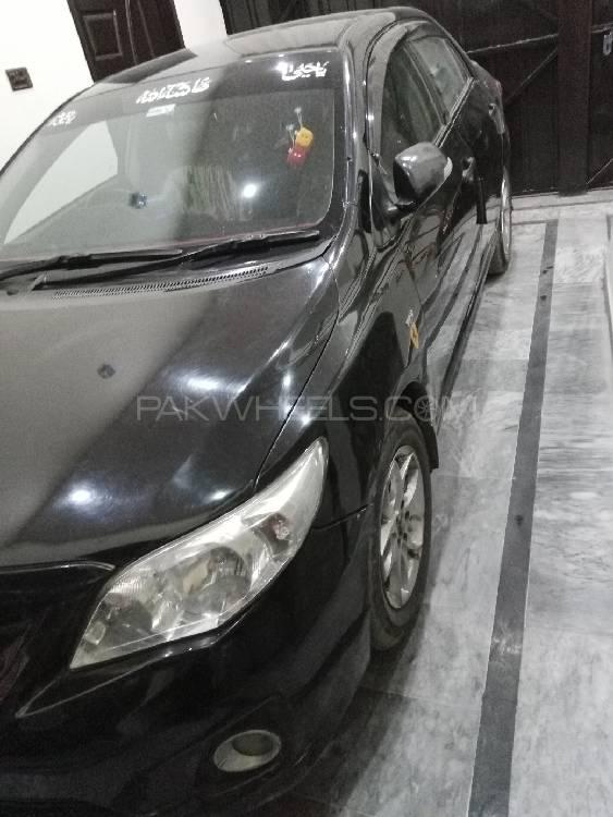 Toyota Corolla 2013 for Sale in Faisalabad Image-1