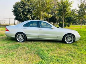 Mercedes-Benz S350  (business package )
2003/December 
import from Japan 2007 registered Islamabad 2010
top of the line specs.
excellent condition
Total original paint ( spotless )
full service history
Silver metallic with black nappa leather interior 
Glass electric Sunroof 
Front seats electric multi power & heating seats
Heated steering wheel 
Self levelling suspension 
8  zone climate control air conditioning 
Xinon headlights 
AMG alloy wheels 
Crome package 
Parktronic access 
Electric curtains 
Spear wheel unused 
Up to date all taxes 
First owner car
Further information please call & physically visit at Victory Cars jail road Lahore.