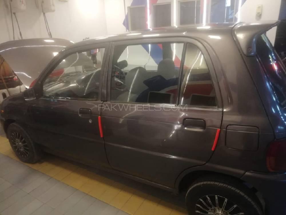 Daihatsu Cuore 2004 for Sale in Rawalpindi Daihatsu Cuore 2004 for Sale in Rawalpindi Image-2