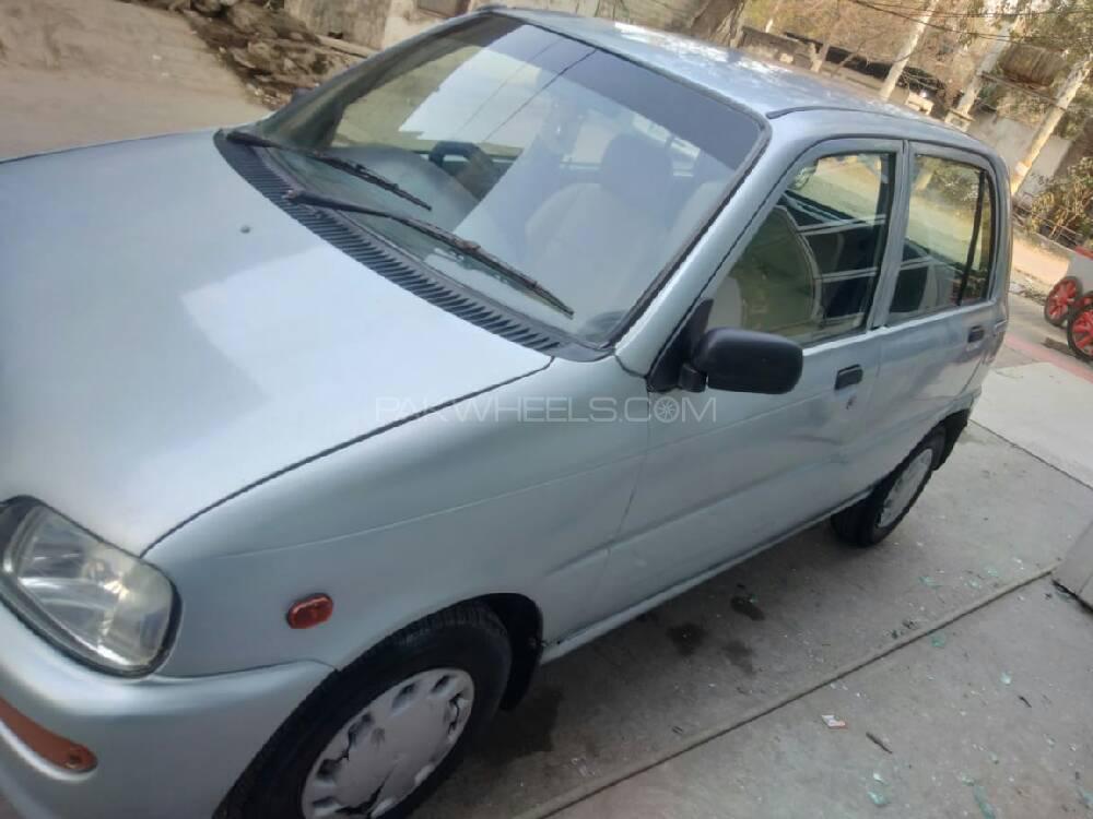 Daihatsu Cuore 2004 for Sale in Faisalabad Image-1