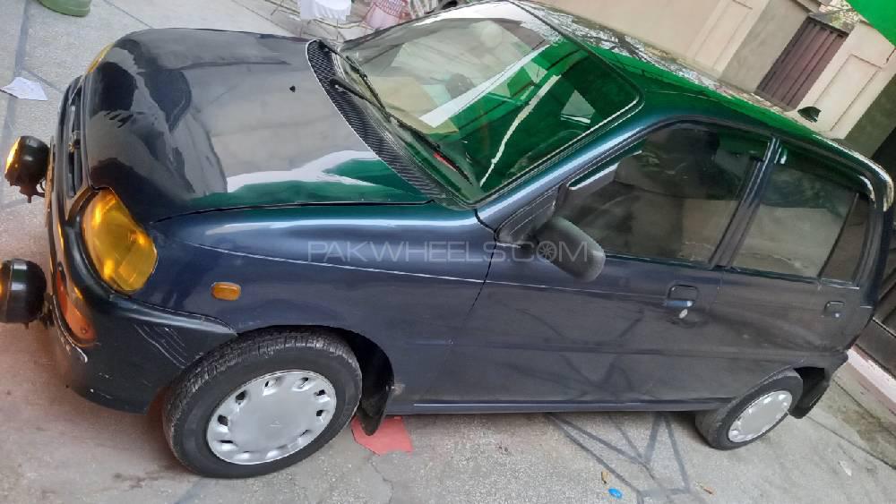 Daihatsu Cuore 2004 for Sale in Faisalabad Daihatsu Cuore 2004 for Sale in Faisalabad Image-12