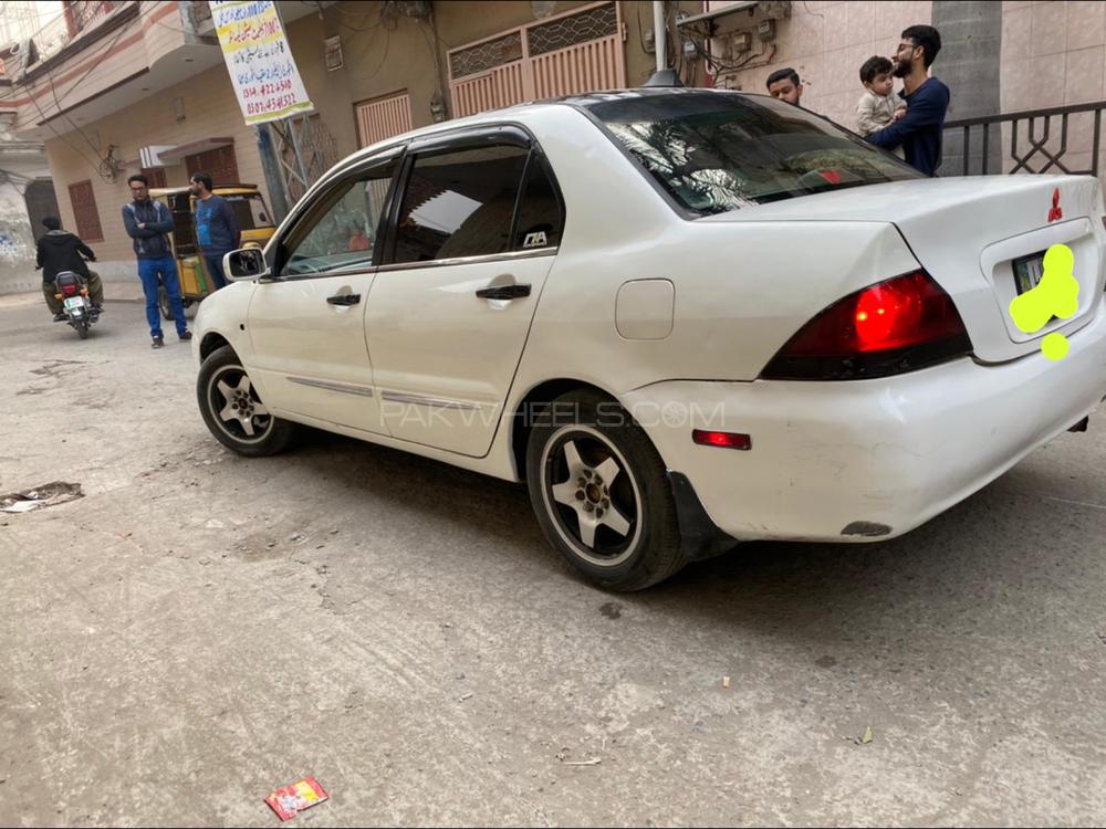 مٹسوبیشی لینسر 2006 for Sale in لاہور مٹسوبیشی لینسر 2006 for Sale in لاہور Image-12