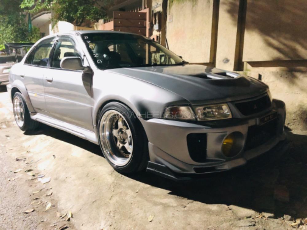 Mitsubishi Lancer Evolution X - 1998  Image-1