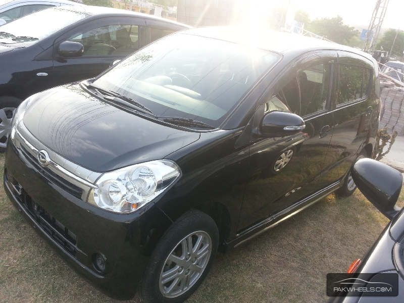 Daihatsu mira 2009 год