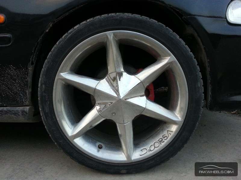17'' Chrome Rims with low profile Tires Image-1