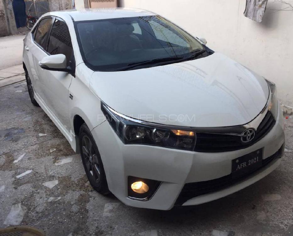 Toyota Corolla 2014 for Sale in Peshawar Toyota Corolla 2014 for Sale in Peshawar Image-10