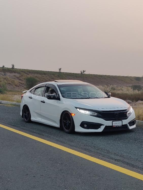 Honda Civic - 2021 White Witch  Image-1