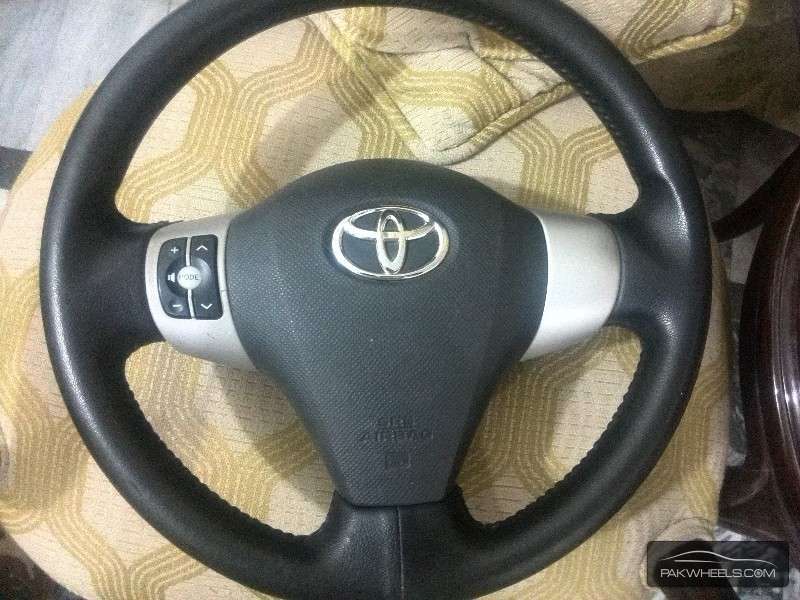 Toyota Vitz,Belta  Multimedia Steering Wheel Full Options Image-1