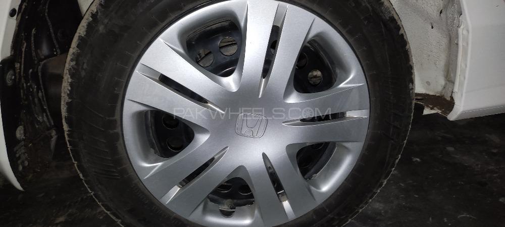 Honda City Model 2022 Trim Wheel with Cover finally 15000  Image-1