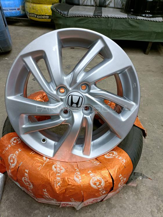 Buy honda city Aspire 2021 jeniune Alloy wheels in Faisalabad PakWheels