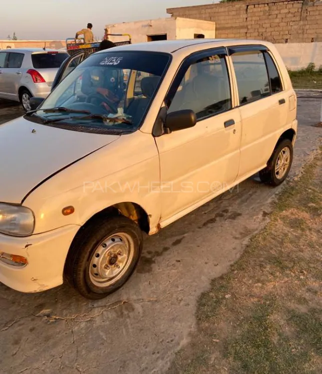 Daihatsu Cuore 2004 for Sale in Kallar Saddiyian Image-1