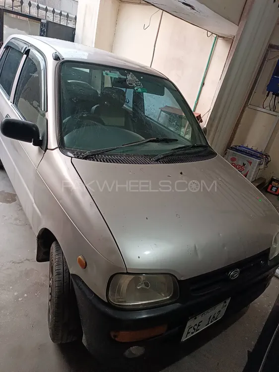 Daihatsu Cuore 2004 for Sale in Faisalabad Image-1