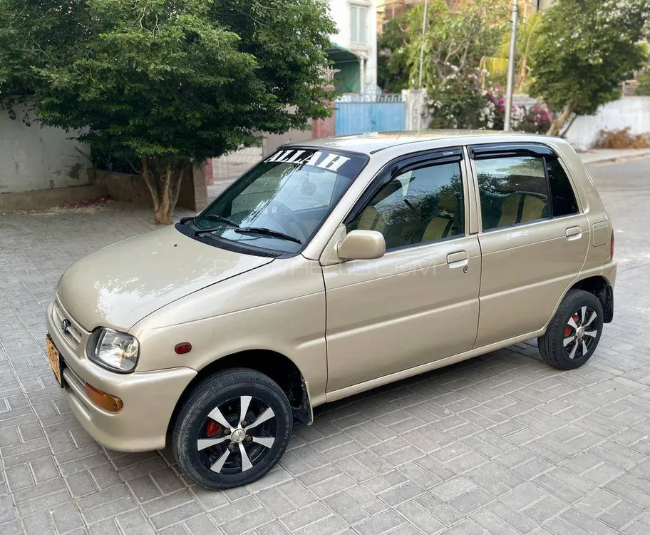 Daihatsu Cuore 2011 for Sale in Karachi Image-1
