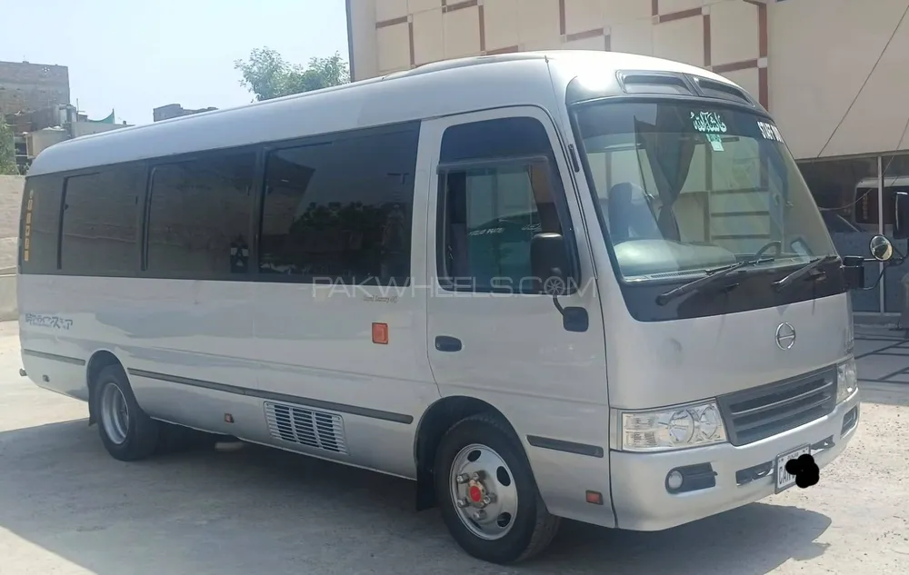 Toyota Coaster 29 Seater F L 2023 for sale in Faisalabad PakWheels