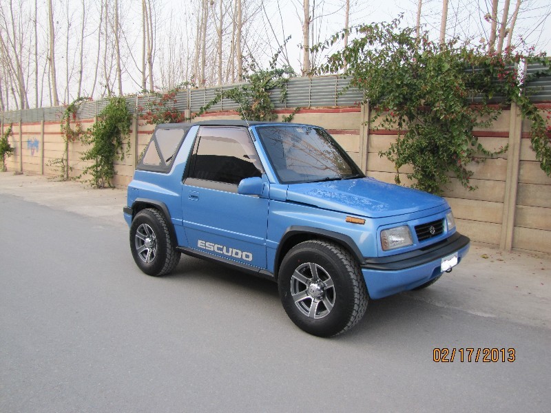 Сузуки 1993. Сузуки Витара 1993. Suzuki Vitara 1993. Судзуки Витара 1993. Suzuki Escudo 1993 кабриолет.